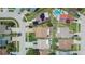Birds eye view of a single-Gathering home in a residential neighborhood, including a large backyard and neighboring houses at 1331 Coolmont Dr, Brandon, FL 33511