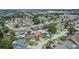 An aerial view showcases a residential neighborhood, revealing tidy lawns and mature trees at 1331 Coolmont Dr, Brandon, FL 33511