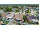 Home featuring a screened patio and fenced backyard, nestled in a neighborhood with mature trees and nearby amenities at 1331 Coolmont Dr, Brandon, FL 33511