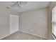 Bedroom with neutral carpet, closet, ceiling fan, and a window letting in natural light at 1331 Coolmont Dr, Brandon, FL 33511