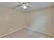 Bedroom with neutral carpeting, ceiling fan, and lots of natural light at 1331 Coolmont Dr, Brandon, FL 33511
