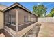 The screened porch provides an enjoyable area for outdoor living with a view of the backyard at 1331 Coolmont Dr, Brandon, FL 33511