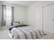 Cozy bedroom with sliding closet doors offering a comfortable and functional space at 13515 Palmera Vista Dr, Riverview, FL 33579