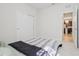 Cozy bedroom with sliding closet doors offering a comfortable and functional space at 13515 Palmera Vista Dr, Riverview, FL 33579
