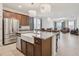Bright kitchen featuring granite countertops, stainless steel appliances, and lots of cabinet space at 13515 Palmera Vista Dr, Riverview, FL 33579