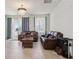 Spacious living room featuring tile flooring and an abundance of natural light at 13515 Palmera Vista Dr, Riverview, FL 33579