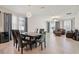 Spacious living area showcasing tile flooring, and an open dining space at 13515 Palmera Vista Dr, Riverview, FL 33579