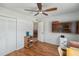 Bedroom with ceiling fan, wood flooring, and closet at 13710 Mission Oaks Blvd # 2A, Seminole, FL 33776