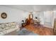 Open living space with dining area and a view into the kitchen at 13710 Mission Oaks Blvd # 2A, Seminole, FL 33776