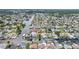 An aerial view shows homes nestled along canals, offering waterfront living and boating access at 13814 Lavender Ave, Hudson, FL 34667