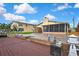 Backyard view of the canal, boatlifts, lanai and waterfront access at 13814 Lavender Ave, Hudson, FL 34667