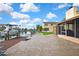Waterfront home features back patio, boat dock, and room for activities at 13814 Lavender Ave, Hudson, FL 34667