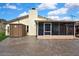 View of the back exterior with a patio with room for activities at 13814 Lavender Ave, Hudson, FL 34667