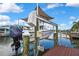 Close up of Boat lift on dock for storing your watercraft at 13814 Lavender Ave, Hudson, FL 34667