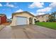 Inviting single-Gathering home featuring attached garage and pristine landscaping, located in a canal-front community at 13814 Lavender Ave, Hudson, FL 34667
