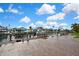 Home features waterfront views with a boat dock and plenty of room for boats at 13814 Lavender Ave, Hudson, FL 34667