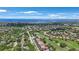 Beautiful aerial shot of the neighborhood near the water with a golf course and mature trees at 1391 Marinella Dr, Palm Harbor, FL 34683