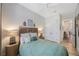 Comfortable bedroom with neutral tones, natural light, and a tranquil atmosphere at 1391 Marinella Dr, Palm Harbor, FL 34683