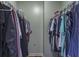 Organized walk-in closet with clothing racks and ample storage space at 1510 Palmer Ct, Palm Harbor, FL 34685