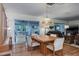 Dining area with sliding glass doors providing natural light and backyard views at 1510 Palmer Ct, Palm Harbor, FL 34685