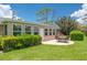 A cozy patio area in the backyard is ideal for relaxation and outdoor enjoyment at 1510 Palmer Ct, Palm Harbor, FL 34685