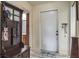 Welcoming foyer with decorative rug and coat rack at 1510 Palmer Ct, Palm Harbor, FL 34685
