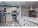 Modern kitchen with granite countertops and stainless steel appliances at 1510 Palmer Ct, Palm Harbor, FL 34685