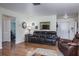Cozy living room with hardwood floors, comfortable furniture, and an inviting atmosphere at 1510 Palmer Ct, Palm Harbor, FL 34685