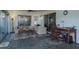 Spacious sunroom with comfortable seating, office area, and large windows offering plenty of light at 1510 Palmer Ct, Palm Harbor, FL 34685