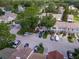 Overhead shot of the home showing parking spaces and some trees at 16175 Rambling Vine E Dr, Tampa, FL 33624