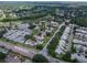 Aerial view of community with landscaped streets, golf course, and easy access to Northdale Blvd at 16175 Rambling Vine E Dr, Tampa, FL 33624