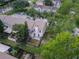 Overhead shot of the back, showing the yard, patio, and fence at 16175 Rambling Vine E Dr, Tampa, FL 33624
