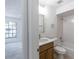 Nicely renovated bathroom includes single sink, vanity, mirror, and shower/tub at 16175 Rambling Vine E Dr, Tampa, FL 33624