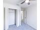 Bedroom features fresh paint and carpet with open closet space at 16175 Rambling Vine E Dr, Tampa, FL 33624