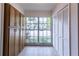 Pantry area featuring multiple cabinets and drawers, as well as a large window at 16175 Rambling Vine E Dr, Tampa, FL 33624