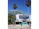 Exterior view of The Florida Aquarium, featuring palm trees and a modern glass dome structure at 1707 Windsor Way, Tampa, FL 33619