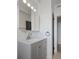 Updated bathroom featuring a modern vanity, quartz countertop and stylish lighting at 1707 Windsor Way, Tampa, FL 33619