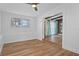 Open-concept space with hardwood floors, lots of natural light and stylishly beamed ceilings at 1707 Windsor Way, Tampa, FL 33619