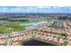 Aerial view of Southshore Bay showcases its expansive lagoon and residential areas at 17140 Holly Well Ave, Wimauma, FL 33598