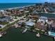 Waterfront community featuring canal access, beautiful landscaping, and luxury homes near the ocean at 202 Howard Dr, Belleair Beach, FL 33786