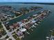 Exclusive waterfront community with private docks, offering serene canal views and access to the open bay at 202 Howard Dr, Belleair Beach, FL 33786