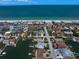 Coastal homes nestled near the beach offer stunning ocean views and easy access to waterfront living at 202 Howard Dr, Belleair Beach, FL 33786
