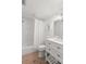 Clean, bright bathroom featuring a shower-tub combo and a classic white vanity at 204 Mindy Dr, Largo, FL 33771