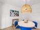 Bright dining area with a unique light fixture and decor at 204 Mindy Dr, Largo, FL 33771
