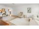 Spacious living room with stylish wood floors, neutral colors, and great natural light at 204 Mindy Dr, Largo, FL 33771