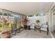 Covered patio area with seating, plants, and a relaxing atmosphere at 204 Mindy Dr, Largo, FL 33771