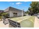 Community recreation area with bocce ball court and shaded benches at 204 Mindy Dr, Largo, FL 33771