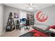 Bedroom featuring a gaming setup, stylish decor, and a comfortable sleeping area at 2306 Emerald Lake Dr, Sun City Center, FL 33573