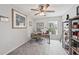 Comfortable office space featuring a desk, shelving, fan and lots of light at 2306 Emerald Lake Dr, Sun City Center, FL 33573