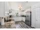 Charming white kitchen with stainless appliances, granite countertops, and ample cabinet space at 2650 60Th N Ave, St Petersburg, FL 33714